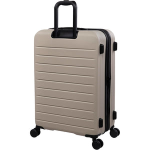 Beige suitcase with black handle and wheels on a white background