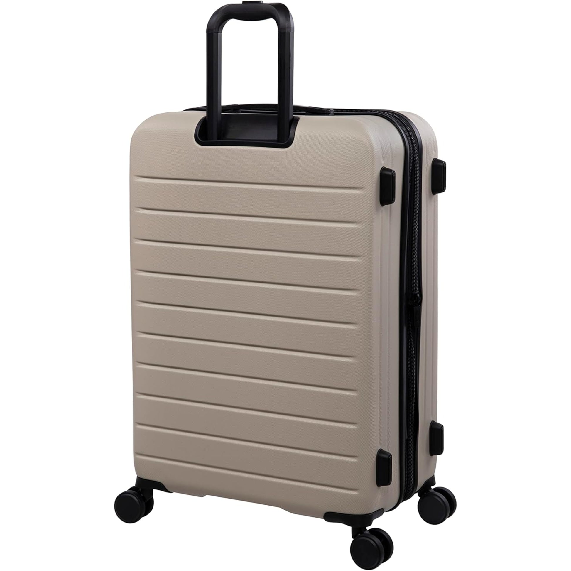 Beige suitcase with black handle and wheels on a white background