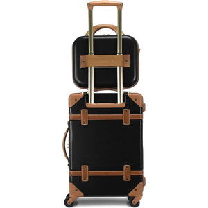 Black suitcase with brown accents and a matching black travel bag on a white background
