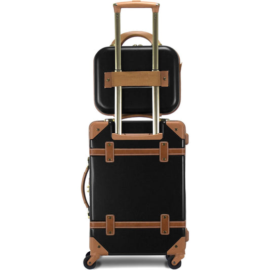 Black suitcase with brown accents and a matching black travel bag on a white background