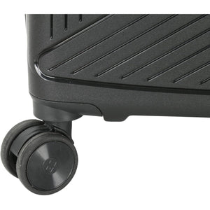 Close-up of a black suitcase wheel on a white background