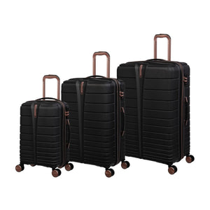 three black cabin bag with bronze handles and wheels on a white background