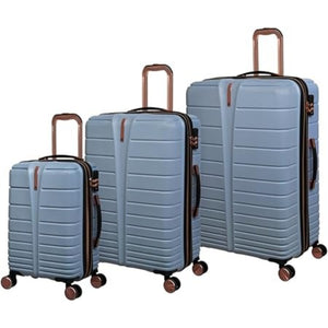 Set of light blue cabin bag with brown handles and wheels on a white background