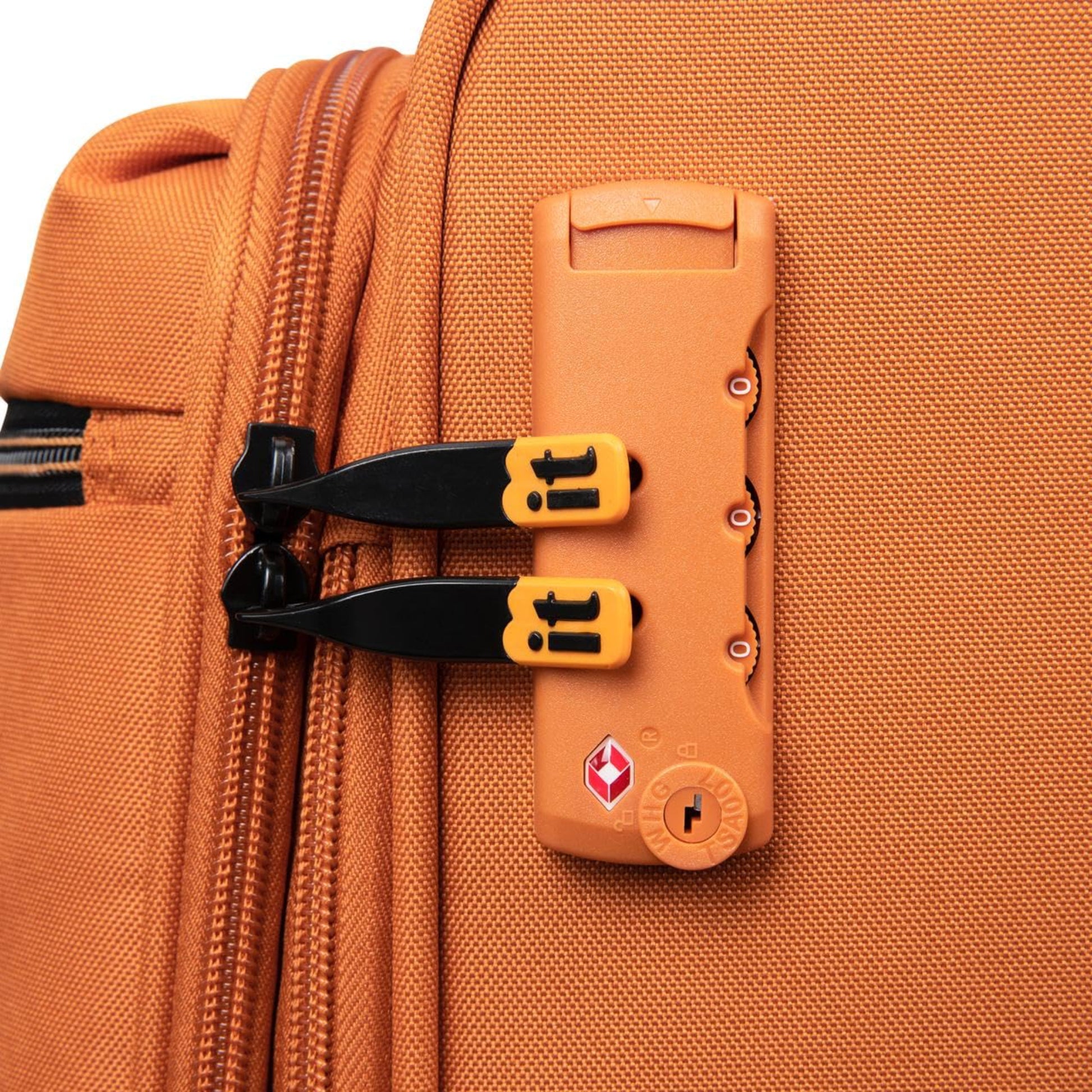 Close-up of an orange suitcase with a lock mechanism