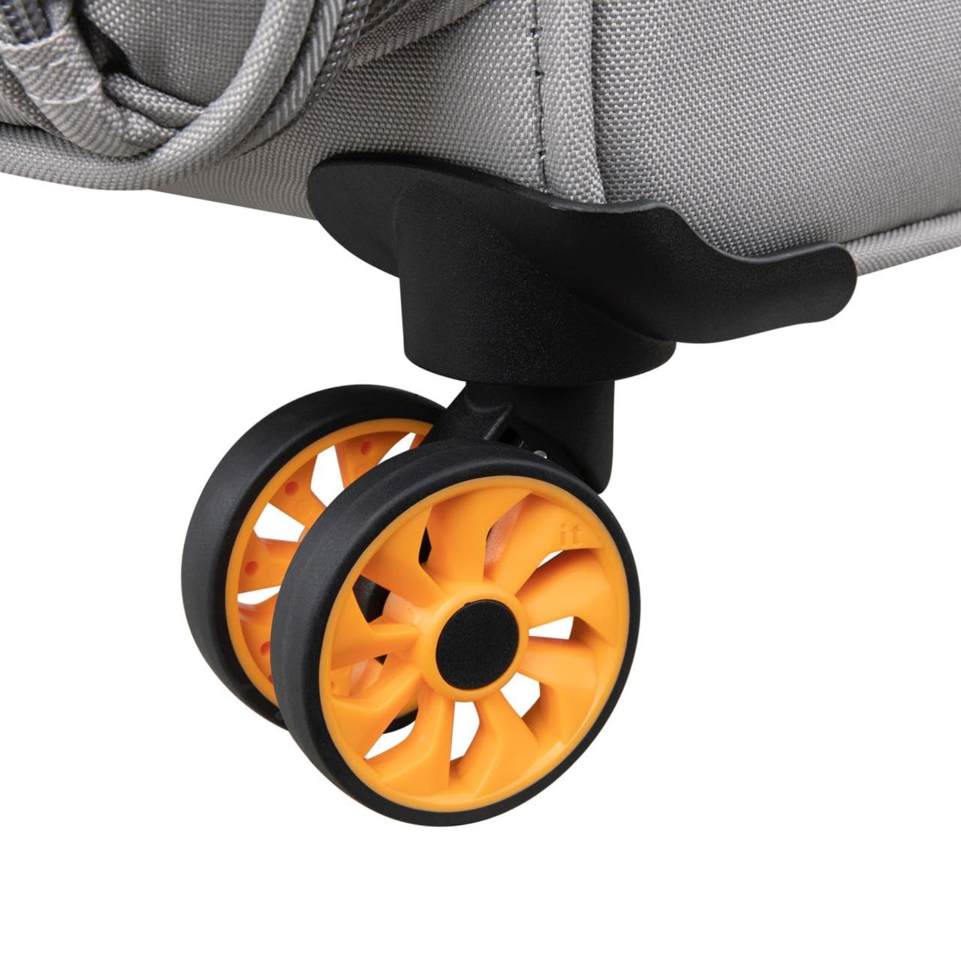 Close-up of a suitcase wheel with orange tire and black rim on a gray background