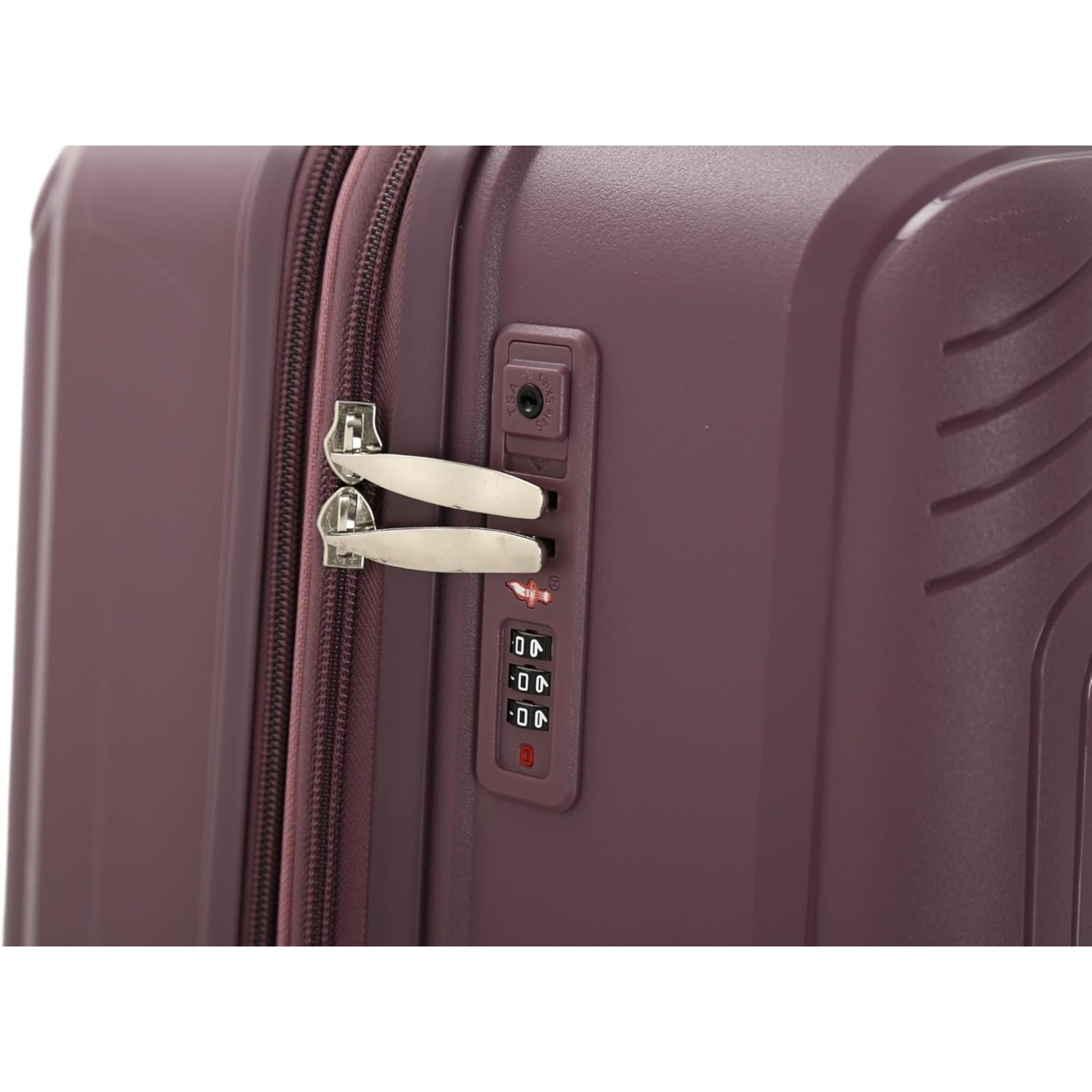 Close-up of a purple suitcase with a combination lock on a white background