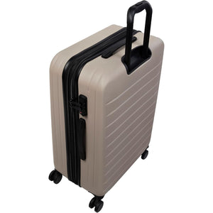 Beige suitcase with black handle and wheels on a white background