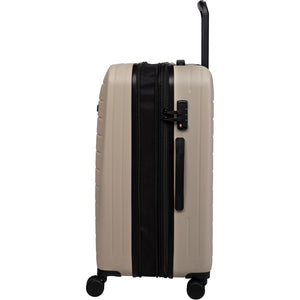 Beige suitcase with black handle and straps on a white background