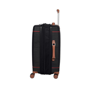 Black it luggage trolly bag with brown handle and wheels on a white background