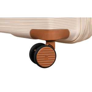 Close-up of a luggage bags wheel on a white background