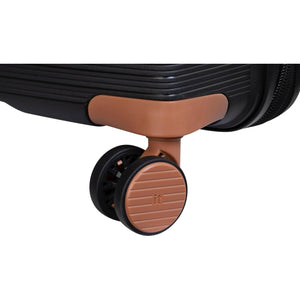 Close-up of a large luggage trolley
wheel on a white background