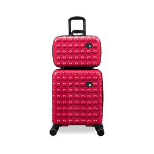 Two red textured suitcases stacked on a white background