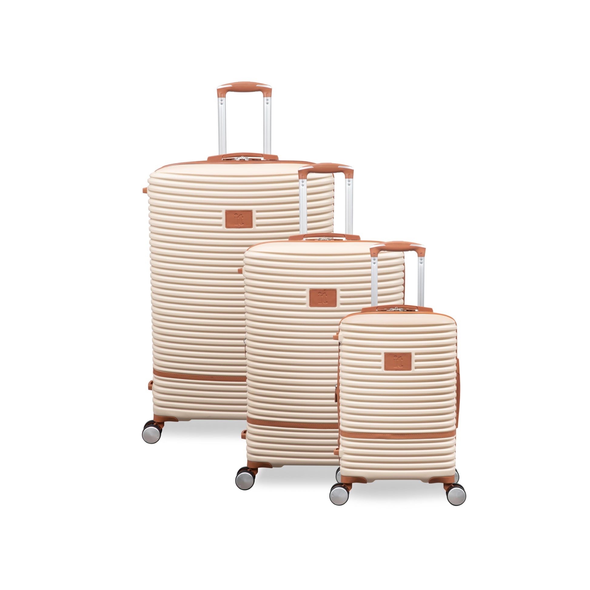 Set of three beige suitcases with brown accents on a white background